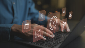 Digital time management system with virtual icons for scheduling, reminders and deadlines. Business professional organizing tasks and time efficiently via an online platform.